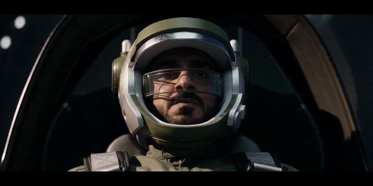 The pioneer in the cockpit, helmet on